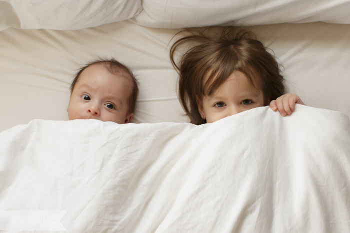 feather and light photography | sibling love | peek-a-boo