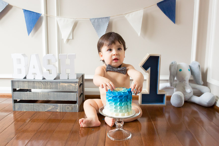 feather + light photography | cake smash | blue cake | baby boy | first birthday