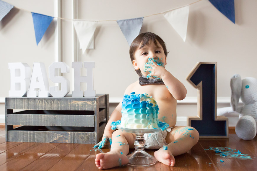 feather + light photography | cake smash | blue cake | baby boy | first birthday