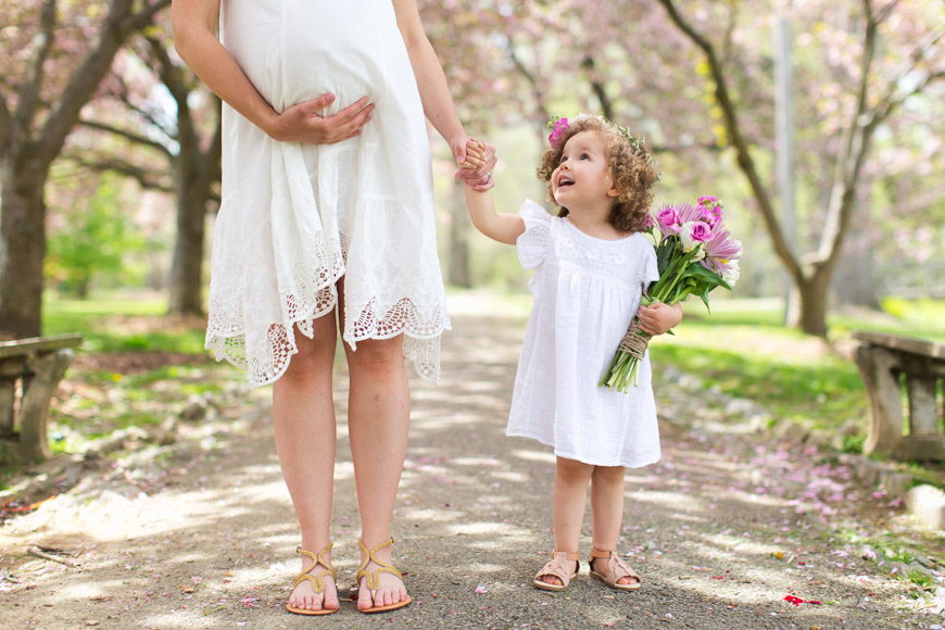 feather + light photography | maternity session with baby girl | pink | floral crowns | spring 