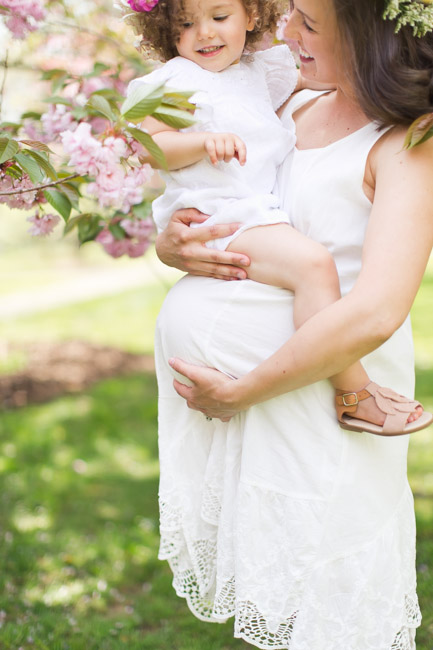 feather + light photography | maternity session with baby girl | pink | floral crowns | spring 