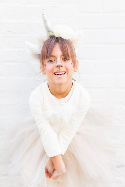 feather + light photography | halloween costumes | batman + unicorn | sibling costume