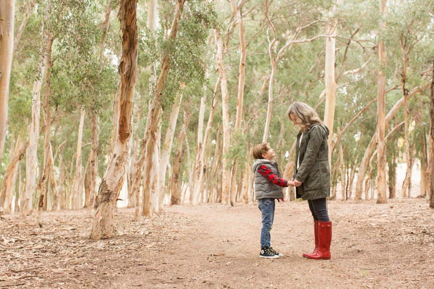 I absolutely love watching families and their littles grow! This is my third year taking the Smith Family photos and I have so enjoyed meeting up with them each and every single time. I also love the change of scenery. The first year we hit up Salt Creek, last year we strolled through downtown San Juan Capistrano, and this year we collected sticks in Serrano Creek Park. Here a just a few of my most favorites of this adorable family!